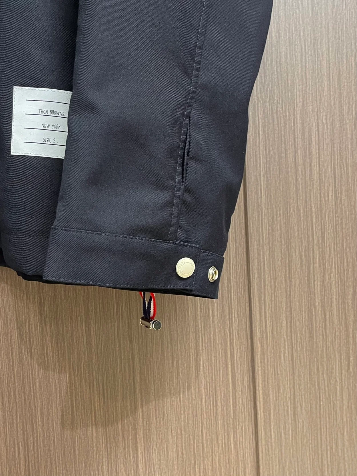 톰브라운 더블 지퍼 래글런 재킷