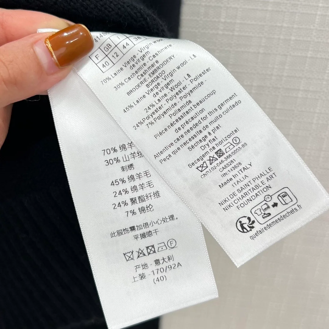 디올 엠브로이더드 스웨터 블랙