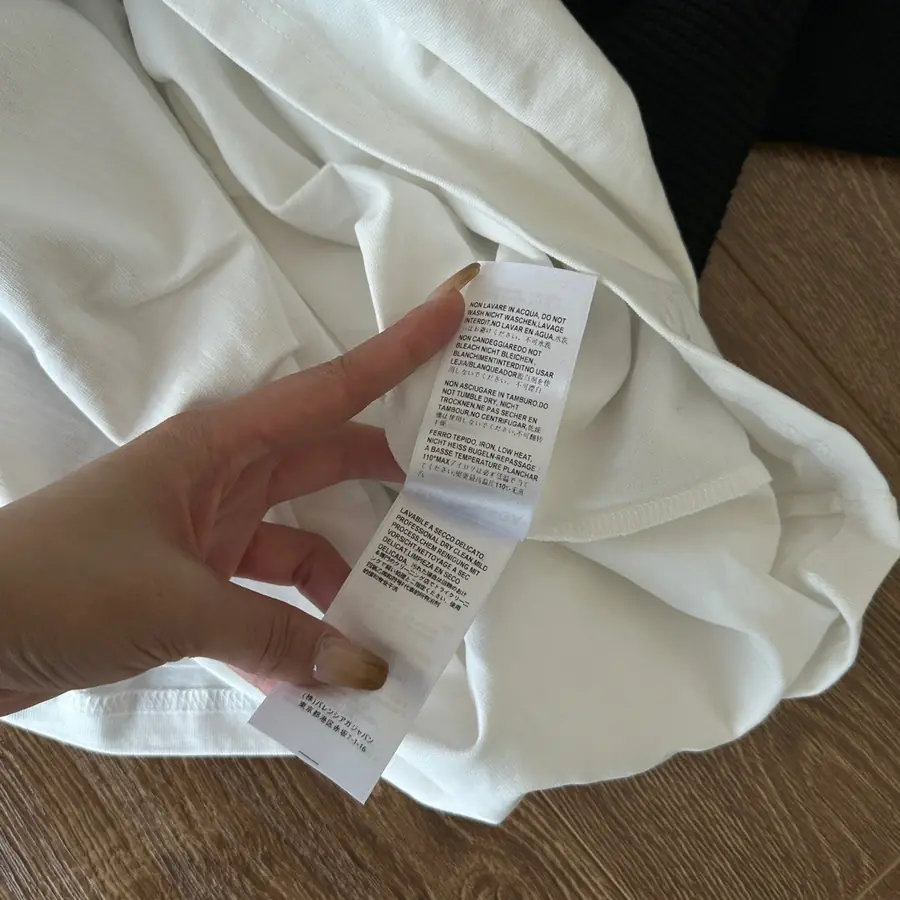 발렌시아가 레이어드 브이넥 니트